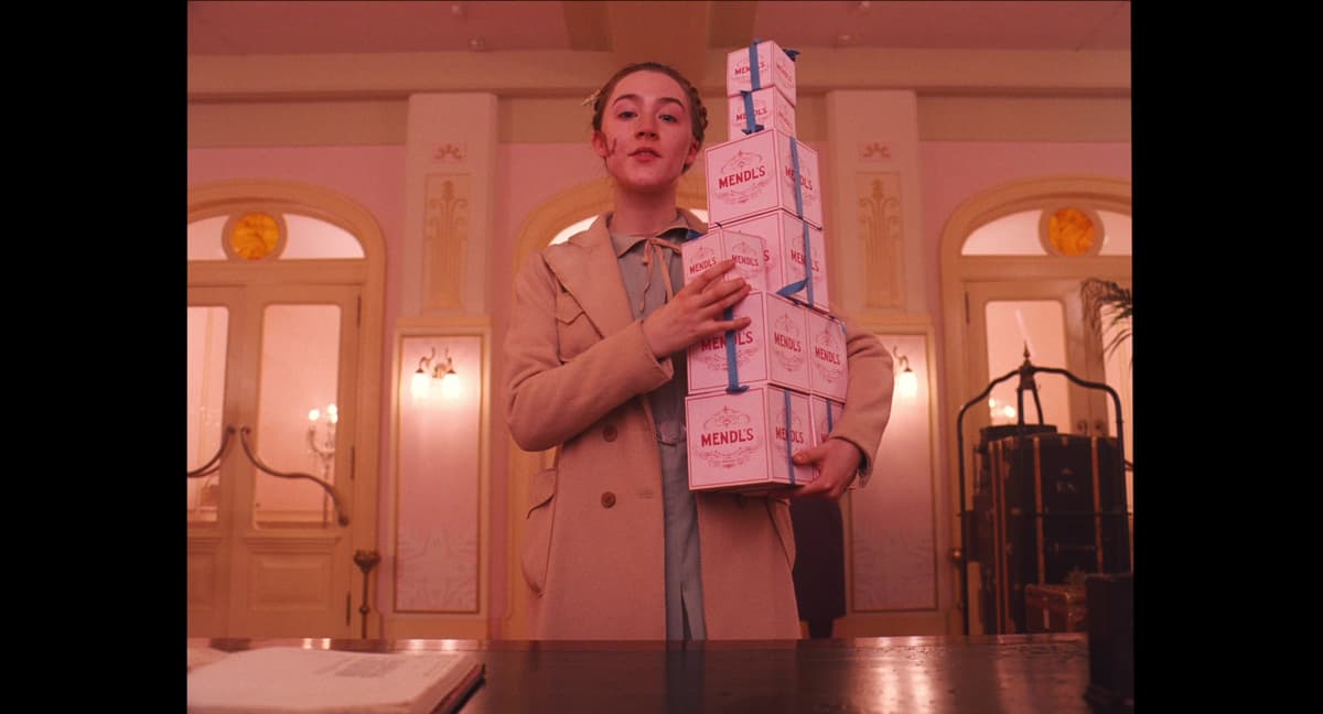 Agatha holding the boxes